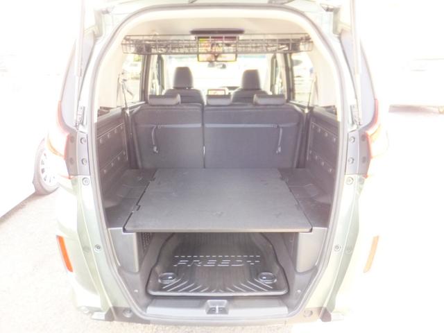 フリード+ハイブリッド ハイブリッド・クロスター 純正9型ナビ/純正15.6型フリップM/CD/DVD/フルセグ/Bluetooth/ETC/Bカメラ/ルーフラック/クルコン/シートヒーター/両自動/LEDライト/LEDフォグ/ルーフレール/Hレザー(50枚目)