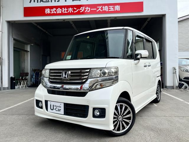 N-BOXカスタム G・ターボAパッケージ 衝突軽減装置・純正ナビ・Rバックカメラ・HIDヘッドライト・フォグライト・ETC・両側パワースライドドア・純正15インチアルミホイール・パドルシフト・スマートキー・Bluetoothオーディオ(3枚目)