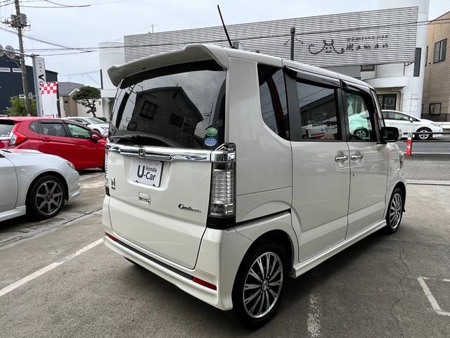 N-BOXカスタム G・ターボAパッケージ 衝突軽減装置・純正ナビ・Rバックカメラ・HIDヘッドライト・フォグライト・ETC・両側パワースライドドア・純正15インチアルミホイール・パドルシフト・スマートキー・Bluetoothオーディオ(5枚目)