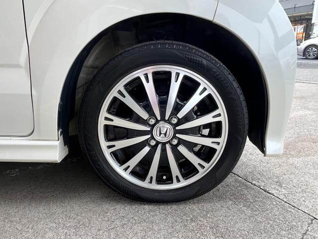 N-BOXカスタム G・ターボAパッケージ 衝突軽減装置・純正ナビ・Rバックカメラ・HIDヘッドライト・フォグライト・ETC・両側パワースライドドア・純正15インチアルミホイール・パドルシフト・スマートキー・Bluetoothオーディオ(8枚目)