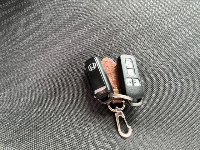 N-BOXカスタム G・ターボAパッケージ 衝突軽減装置・純正ナビ・Rバックカメラ・HIDヘッドライト・フォグライト・ETC・両側パワースライドドア・純正15インチアルミホイール・パドルシフト・スマートキー・Bluetoothオーディオ(23枚目)