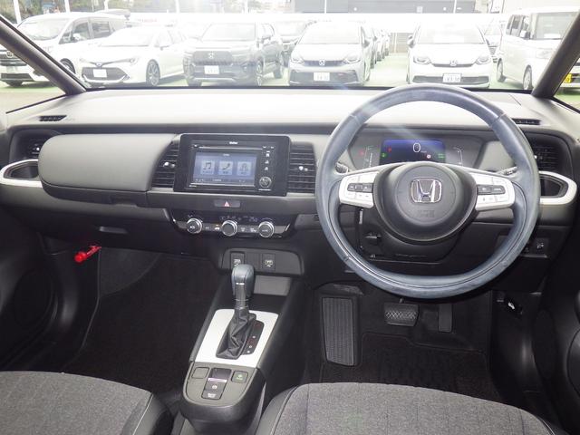 フィット e:HEVホーム ワンオーナー車◆CD◆ワンセグTV◆バックカメラ◆スマートキー◆セキュリティアラーム◆電動格納ドアミラー◆LEDヘッドライト◆アルミホイール◆追従オートクルーズ◆衝突被害軽減ブレーキ◆ホンダセンシング(6枚目)