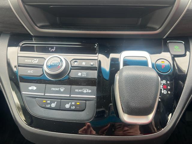 フリードハイブリッド ハイブリッド・Gホンダセンシング 軽減ブレーキ キーフリーシステム 記録簿 DVD再生可能 サイドカーテンエアバック 後カメラ Aクルーズ LEDヘッドランプ シートH 横滑防止 ドライブレコーダ(14枚目)