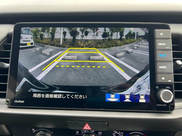 フィット ホーム 衝突軽減ブレーキ ワンオーナー リアカメ LEDライト フルセグTV 記録簿付 エアバッグ iストップ スマ-トキ- 盗難防止装置 ETC車載器 Wエアバック フルオートエアコン DVD(3枚目)