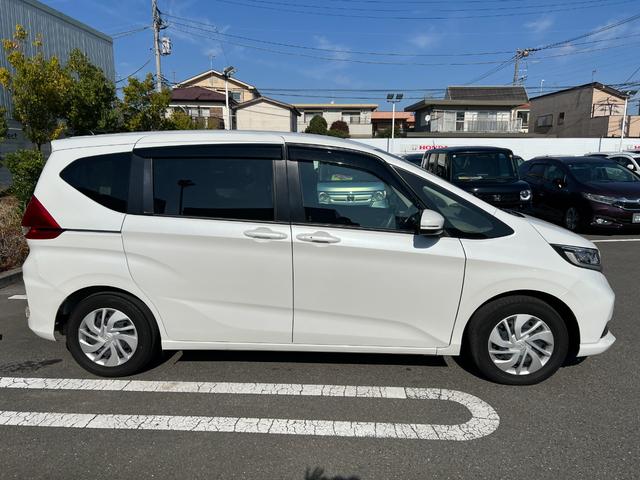 フリード Ｇ・ホンダセンシング　Ｆセグ　ｉストップ　Ｗエアバッグ　パワーウィンドウ　アクティブクルーズコントロール　スマートキ　カーテンエアバッグ　カラーバックモニター　整備点検記録簿　ＶＳＡ　エアコン　ＵＳＢ（6枚目）