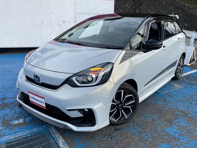 フィット ｅ：ＨＥＶホーム　無限フルエアロ＆ＬＥＤデイライト＆マフラー＆デカールセット　２トーン　コンフォートビューＰＫＧ　純正９インチナビ　バックカメラ　フルセグ　ＤＶＤ　ＢＴ　前後ドラレコ　ＥＴＣ　クリアランスソナー　禁煙車（2枚目）