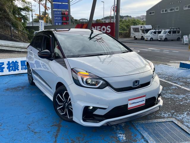 フィット ｅ：ＨＥＶホーム　無限フルエアロ＆ＬＥＤデイライト＆マフラー＆デカールセット　２トーン　コンフォートビューＰＫＧ　純正９インチナビ　バックカメラ　フルセグ　ＤＶＤ　ＢＴ　前後ドラレコ　ＥＴＣ　クリアランスソナー　禁煙車（5枚目）