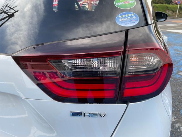 フィット ｅ：ＨＥＶホーム　無限フルエアロ＆ＬＥＤデイライト＆マフラー＆デカールセット　２トーン　コンフォートビューＰＫＧ　純正９インチナビ　バックカメラ　フルセグ　ＤＶＤ　ＢＴ　前後ドラレコ　ＥＴＣ　クリアランスソナー　禁煙車（33枚目）