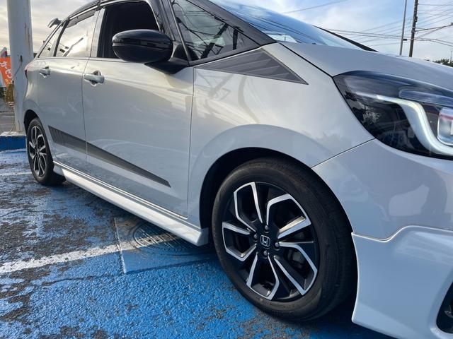 フィット ｅ：ＨＥＶホーム　無限フルエアロ＆ＬＥＤデイライト＆マフラー＆デカールセット　２トーン　コンフォートビューＰＫＧ　純正９インチナビ　バックカメラ　フルセグ　ＤＶＤ　ＢＴ　前後ドラレコ　ＥＴＣ　クリアランスソナー　禁煙車（36枚目）