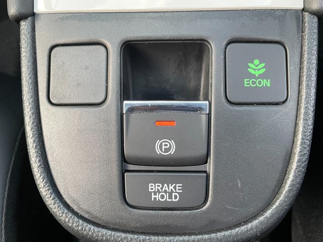 フィット ｅ：ＨＥＶホーム　無限フルエアロ＆ＬＥＤデイライト＆マフラー＆デカールセット　２トーン　コンフォートビューＰＫＧ　純正９インチナビ　バックカメラ　フルセグ　ＤＶＤ　ＢＴ　前後ドラレコ　ＥＴＣ　クリアランスソナー　禁煙車（65枚目）