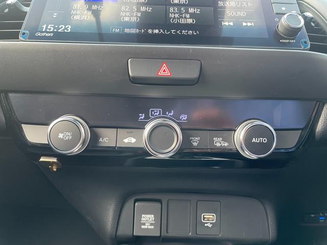 フィット ｅ：ＨＥＶホーム　無限フルエアロ＆ＬＥＤデイライト＆マフラー＆デカールセット　２トーン　コンフォートビューＰＫＧ　純正９インチナビ　バックカメラ　フルセグ　ＤＶＤ　ＢＴ　前後ドラレコ　ＥＴＣ　クリアランスソナー　禁煙車（67枚目）