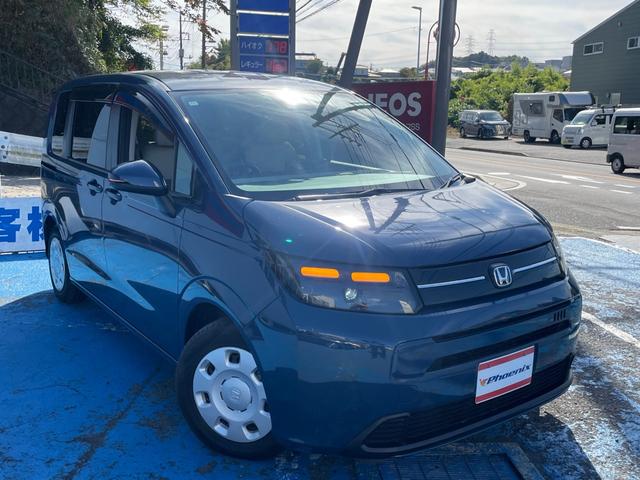 フリード ｅ：ＨＥＶエアー　ホンダセンシング　１１．４型ナビ　フルセグＴＶ　Ｂｌｕｅｔｏｏｔｈ接続　バックカメラ　前後ドラレコ　ＥＴＣ２．０　Ｐソナー　ＬＥＤオートライト　ステアスイッチ　両側電動スライドドア　ＣＭＢＳ　ＬＫＡＳ（5枚目）