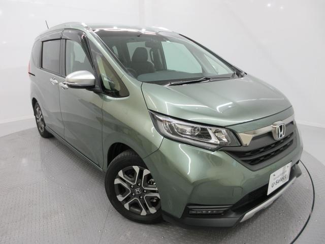 フリードハイブリッド ハイブリッド・クロスター 純正9インチメモリーナビ 10インチリヤルーフモニター 純正前後ドライブレコーダー フロント左右シートヒーター サイドエアバッグ 純正アルミホイール LEDヘッドライト ETC2.0 禁煙車 6人乗り(7枚目)