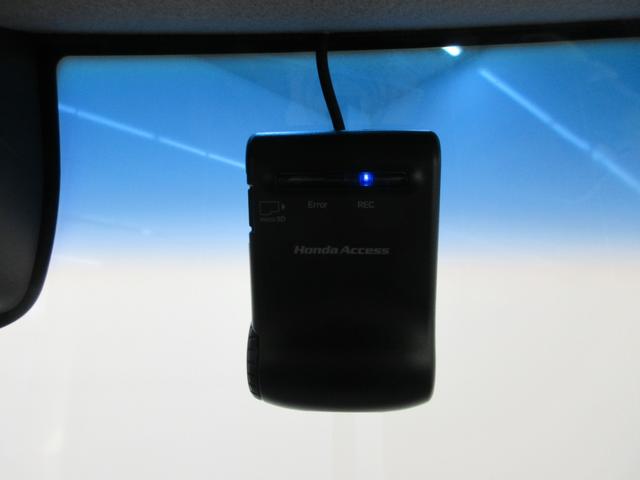 N-BOX G・Lパッケージ 純正ギャザズメモリーナビ 純正フロントドライブレコーダー 左右電動スライドドア 衝突軽減ブレーキ サイドエアバッグ ディスチャージヘッドライト リヤカメラ リヤシートスライド ETC 禁煙車(4枚目)