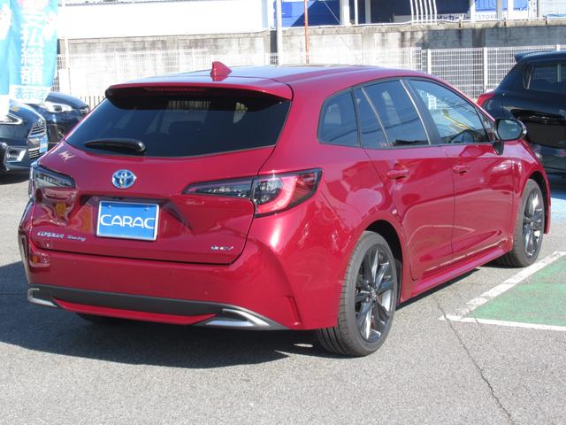 カローラツーリング ハイブリッド　ダブルバイビー　ディーラー社用車　１０．５インチフルセグナビ（前後ドラレコ内蔵）　ＢｌｕｅＴｏｏｔｈ　バックカメラ　ブレインドスポットモニター　カラーヘッドアップディスプレイ　安心降車アシスト　１５００Ｗコンセント（3枚目）