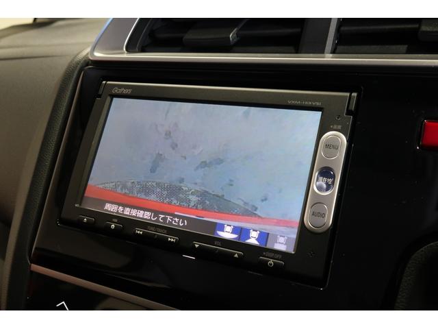 フィット １３Ｇ・Ｆパッケージ　認定中古車ナビＢカメラワンオーナー　エコモード　運転席助手席エアバック　カーテンエアバッグ　リアカメラ　ＤＶＤ再生可能　１セグＴＶ　イモビ　マニュアルエアコン　スマートキーシステム　ナビ＆ＴＶ　ＡＢＳ（7枚目）