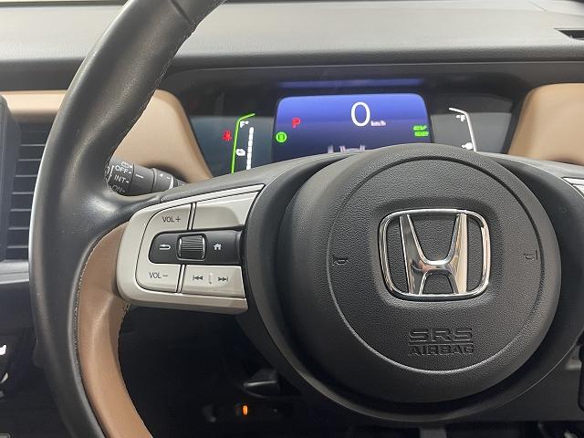 フィット e:HEVリュクス 9インチナビ 衝突被害軽減システム レーンアシスト レーダークルーズコントロール クリアランスソナー フルセグ Bluetooth Bカメラ ETC スマートキー 純正ドラレコ ハンドルヒーター(24枚目)