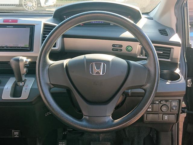 フリード G ジャストセレクション・3列シート・7人乗り・ワンオーナー ・禁煙車・パイオニア製メモリーナビゲーション・ETC車載器・パワースライドドア・スマートキーx2・整備記録簿&取扱説明書(27枚目)