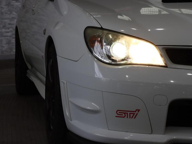 インプレッサ ＷＲＸ　ＳＴｉ　４ＷＤ／６速ＭＴ／フルエアロ／湾岸ダウンサス／ブレンボキャリパー／ＷＯＲＫ　ＥＭＯＴＩＯＮ１８ＡＷ／革巻きステアリング／ＥＴＣ／ストラーダナビ／地デジ／ＨＩＤヘッドライト／水平対向エンジン（14枚目）