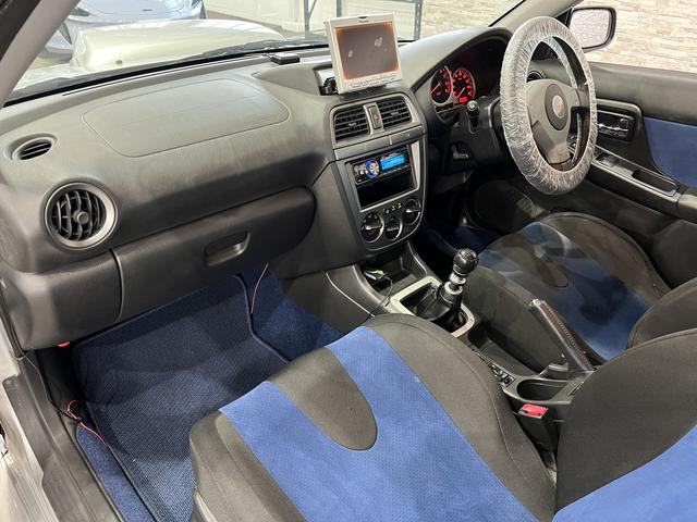 インプレッサ WRX STi 6速MT/4WD/RAYSグラムライツ17インチAW/HKS車高調/ブレンボキャリパー/大型リアスポイラー/STi専用シート&ステアリング/ETC/キーレスエントリー/HIDヘッドライト(34枚目)