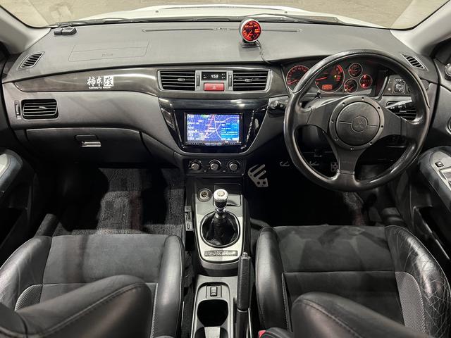 ランサー ＧＳＲエボリューションＩＸ　４ＷＤ／６速ＭＴ／クスコ車高調／前後ブレンボキャリパー／Ｗｅｄｓ　Ｓｐｏｒｔ１７ＡＷ／半革レカロシート／デジタルインナーミラー／キーレス／ＥＴＣ／カロッツェリアナビ／Ｂｌｕｅｔｏｏｔｈ／Ｄ記録簿（26枚目）