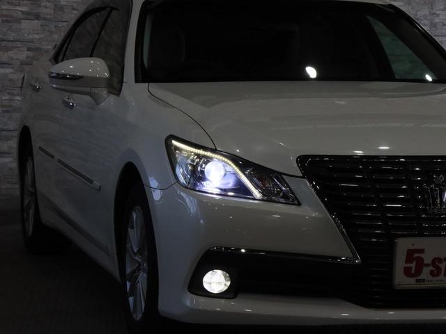 クラウン ロイヤルサルーン　ＴＲＤトランクスポイラー／電動シート／クルーズコントロール／クリアランスソナー／スマートキー／ＥＴＣ／横滑り防止装置／純正ナビ／Ｂｌｕｅｔｏｏｔｈ／バックカメラ／地デジ／ＨＩＤオートライト／純正ＡＷ（15枚目）