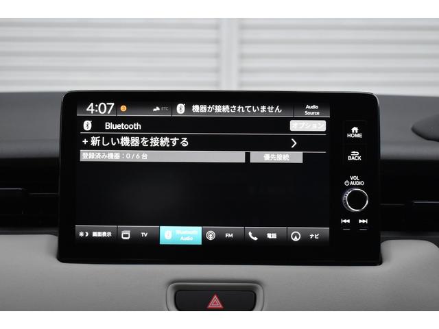 ヴェゼル ｅ：ＨＥＶ　Ｚ・ＰＬａＹパッケージ　ホンダセンシング　ブラインドスポットインフォメーション　パノラマルーフ　ディスプレイオ－ディオ　マルチビュ－カメラ　後退出庫サポ－ト　シ－トヒ－タ－　電動リアゲート　純正１８インチアルミホイール（23枚目）