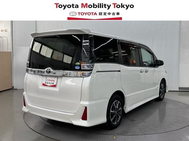 ヴォクシー ＺＳ　煌　地上デジタル　ＴＳＳ　両側パワードア　アイドリングストップ車　パワーウィンド　横滑防止　整備記録簿　ＤＶＤ可　フルフラットシート　盗難防止装置　スマートエントリー　Ｂカメラ　ＡＵＸ　ＬＥＤヘッドライト（2枚目）