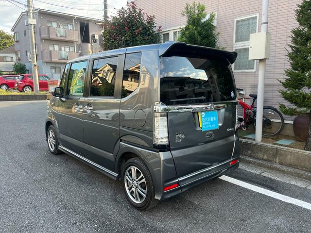 N-BOX+カスタム G・ターボパッケージ スマ-トキ- パワーウインドウ 禁煙 エアB iストップ ターボ車 ETC付き 電動格納ミラー ナビ SDナビ パワステ 両側オートスライドドア 整備記録簿 ABS 運転席助手席エアバッグ(4枚目)