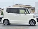Ｎ－ＢＯＸカスタム Ｇ・Ｌパッケージ　禁煙車／左側電動スライドドア／純正メモリーナビ／ワンセグＴＶ／ＢＬＵＥＴＯＯＴＨ／バックカメラ／ＨＩＤヘッドライト／純正１４インチアルミ／スマートキー／ＥＴＣ／横滑り防止装置／オートライト／パワステ／（7枚目）