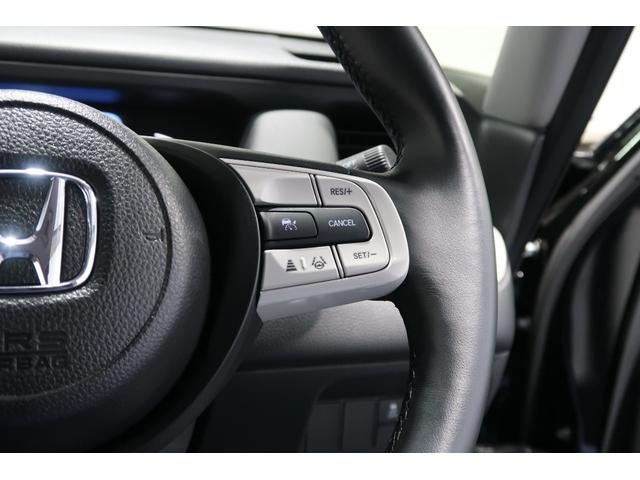 フィット e:HEVホーム 当社デモカー/バックカメラ/フルセグTV/メモリーナビ/インターナビ/盗難防止装置/USB入力電子/Bluetooth/CD/DVD再生/LEDヘッドライト/フロアマット/ETC/オートライト ACC(13枚目)