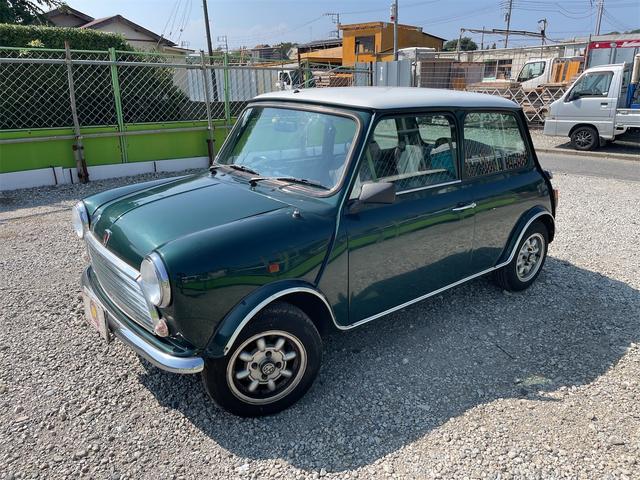 MINI スプライトi マニュアル4速車 屋根付き車庫保管 長期前オーナー使用者 アルミ 同色オーバーフェンダー エアコン ETC 革巻きステアリング(2枚目)