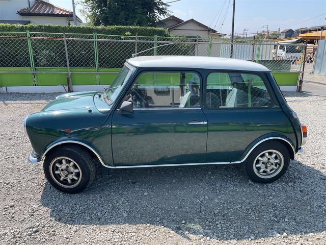 MINI スプライトi マニュアル4速車 屋根付き車庫保管 長期前オーナー使用者 アルミ 同色オーバーフェンダー エアコン ETC 革巻きステアリング(3枚目)