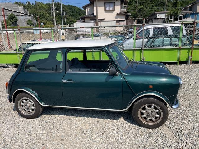 MINI スプライトi マニュアル4速車 屋根付き車庫保管 長期前オーナー使用者 アルミ 同色オーバーフェンダー エアコン ETC 革巻きステアリング(4枚目)