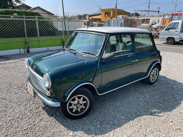 MINI スプライトi マニュアル4速車 屋根付き車庫保管 長期前オーナー使用者 アルミ 同色オーバーフェンダー エアコン ETC 革巻きステアリング(5枚目)