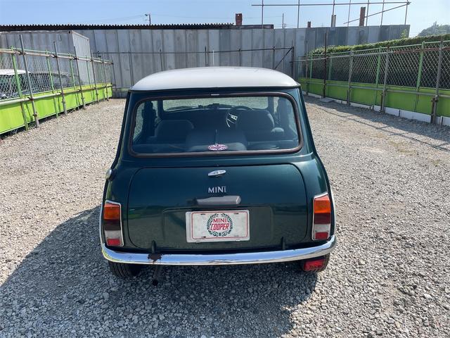 MINI スプライトi マニュアル4速車 屋根付き車庫保管 長期前オーナー使用者 アルミ 同色オーバーフェンダー エアコン ETC 革巻きステアリング(8枚目)