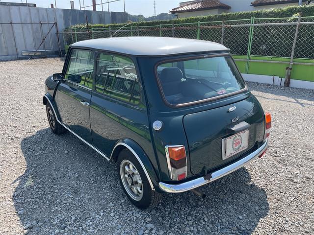 MINI スプライトi マニュアル4速車 屋根付き車庫保管 長期前オーナー使用者 アルミ 同色オーバーフェンダー エアコン ETC 革巻きステアリング(10枚目)