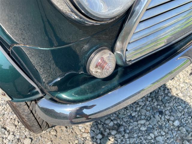 MINI スプライトi マニュアル4速車 屋根付き車庫保管 長期前オーナー使用者 アルミ 同色オーバーフェンダー エアコン ETC 革巻きステアリング(11枚目)