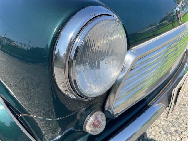 MINI スプライトi マニュアル4速車 屋根付き車庫保管 長期前オーナー使用者 アルミ 同色オーバーフェンダー エアコン ETC 革巻きステアリング(13枚目)