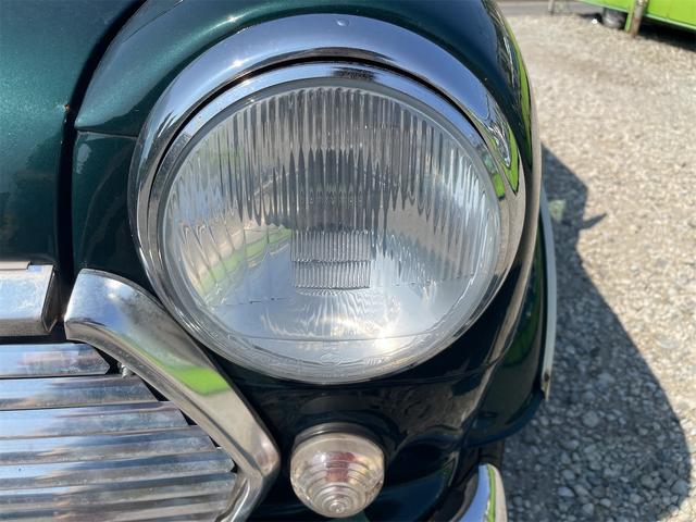 MINI スプライトi マニュアル4速車 屋根付き車庫保管 長期前オーナー使用者 アルミ 同色オーバーフェンダー エアコン ETC 革巻きステアリング(14枚目)