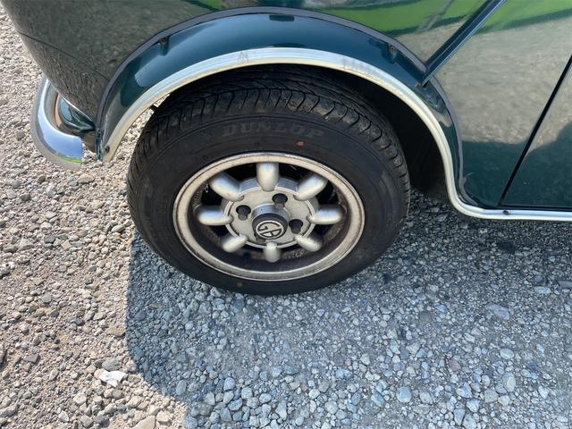 MINI スプライトi マニュアル4速車 屋根付き車庫保管 長期前オーナー使用者 アルミ 同色オーバーフェンダー エアコン ETC 革巻きステアリング(22枚目)