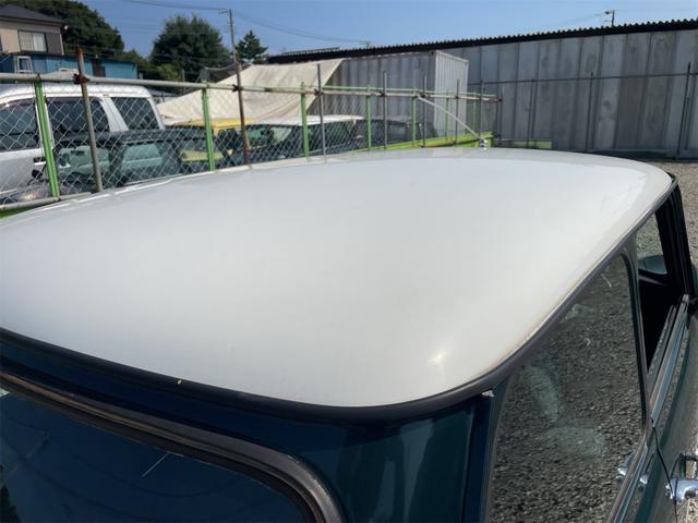 MINI スプライトi マニュアル4速車 屋根付き車庫保管 長期前オーナー使用者 アルミ 同色オーバーフェンダー エアコン ETC 革巻きステアリング(25枚目)