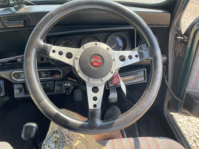 MINI スプライトi マニュアル4速車 屋根付き車庫保管 長期前オーナー使用者 アルミ 同色オーバーフェンダー エアコン ETC 革巻きステアリング(28枚目)