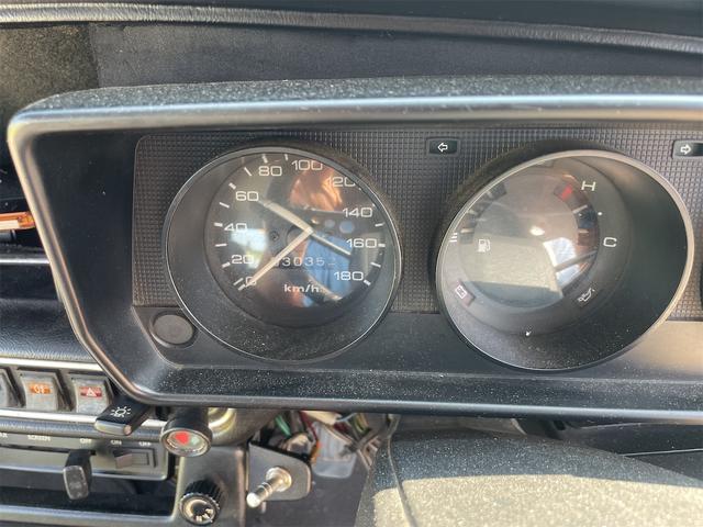 MINI スプライトi マニュアル4速車 屋根付き車庫保管 長期前オーナー使用者 アルミ 同色オーバーフェンダー エアコン ETC 革巻きステアリング(29枚目)