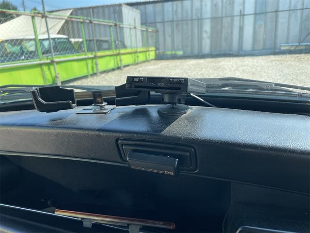 MINI スプライトi マニュアル4速車 屋根付き車庫保管 長期前オーナー使用者 アルミ 同色オーバーフェンダー エアコン ETC 革巻きステアリング(32枚目)