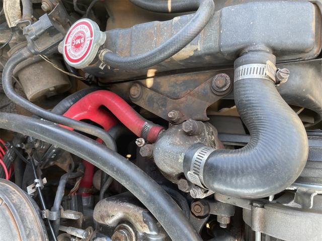 MINI スプライトi マニュアル4速車 屋根付き車庫保管 長期前オーナー使用者 アルミ 同色オーバーフェンダー エアコン ETC 革巻きステアリング(36枚目)