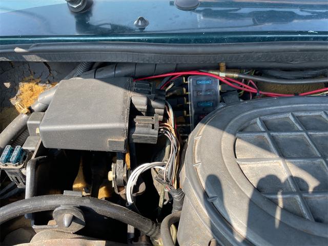 MINI スプライトi マニュアル4速車 屋根付き車庫保管 長期前オーナー使用者 アルミ 同色オーバーフェンダー エアコン ETC 革巻きステアリング(37枚目)