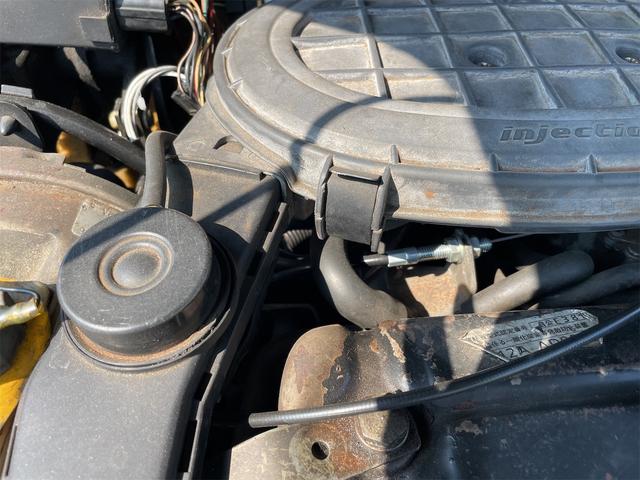 MINI スプライトi マニュアル4速車 屋根付き車庫保管 長期前オーナー使用者 アルミ 同色オーバーフェンダー エアコン ETC 革巻きステアリング(38枚目)