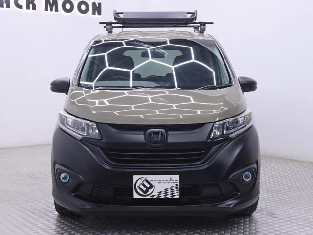 フリードハイブリッド ハイブリッド・EX オリジナルアウトドアカスタム ホンダセンシング ハーフレザー 新品ホイール/タイヤ/ルーフキャリア・ラック 両側電動スライドドア 純正メモリーナビ バックカメラ フリップダウンモニター シートヒーター(4枚目)