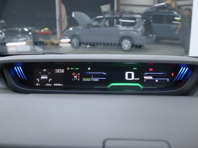 フリードハイブリッド ハイブリッド・EX オリジナルアウトドアカスタム ホンダセンシング ハーフレザー 新品ホイール/タイヤ/ルーフキャリア・ラック 両側電動スライドドア 純正メモリーナビ バックカメラ フリップダウンモニター シートヒーター(9枚目)